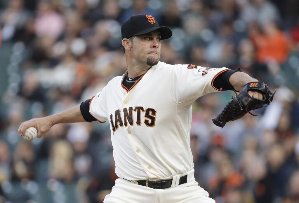 San Francisco Giants starting pitcher Ryan Vogelsong throws against the Pittsburgh Pirates in the first inning of their baseball game Monday, June 1, 2015, in San Francisco. (AP Photo/Eric Risberg)