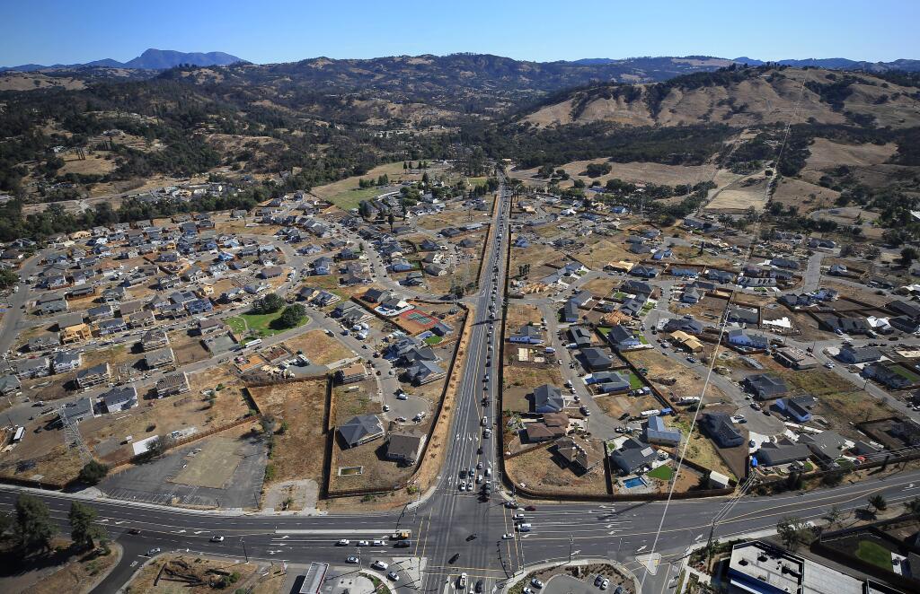 Old Redwood Highway and Mark West Springs Road splits Larkfield in the Tubbs fire rebuild zone, Friday, Sept. 20, 2019. (Kent Porter / The Press Democrat)