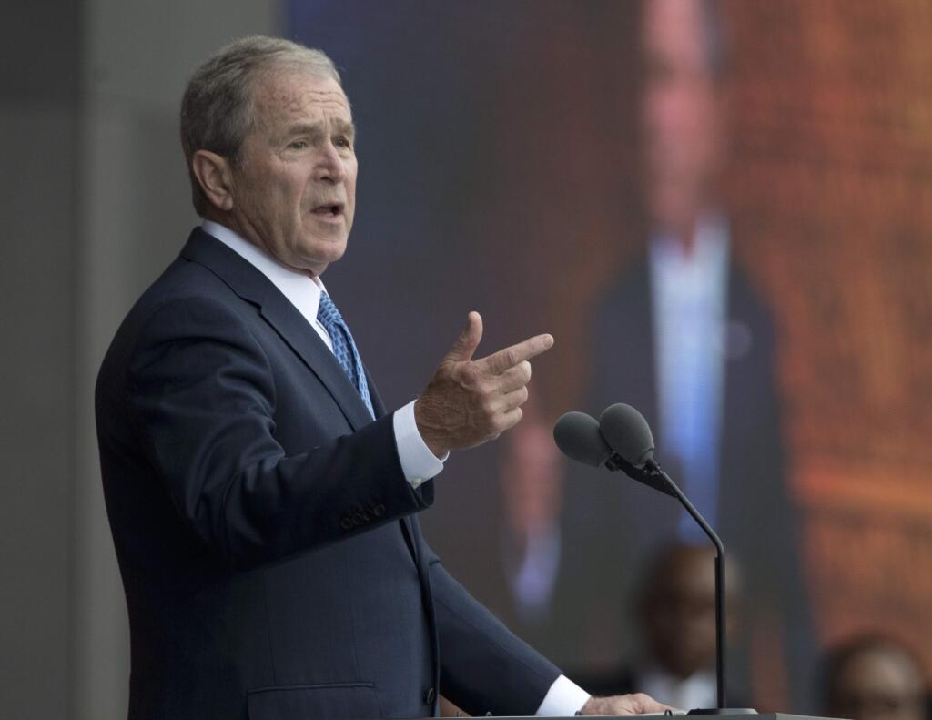 FILE - In this Sept. 24, 2016 file photo, former President George W. Bush speaks in Washington. Bush said Monday, Feb. 27, 2017, 'we all need answers' on the extent of contact between President Donald Trump's team and the Russian government, and he defended the media's role in keeping world leaders in check. (AP Photo/Manuel Balce Ceneta, File)