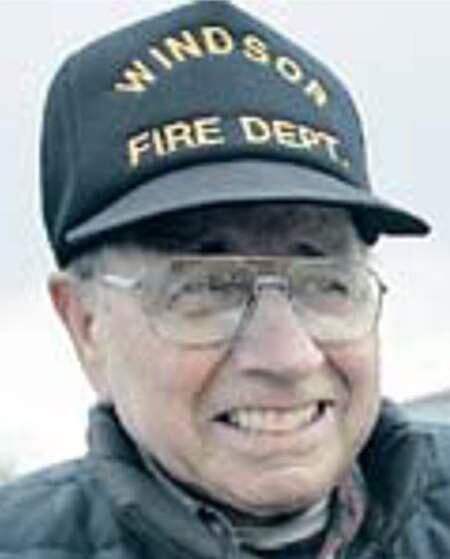 PHOTO: mug: Vic Pozzi-Helped form the Windsor Fire Protection District in 1954 in an old blacksmith's shop with a 1954 open-cab Dodge pumper wagon with a 500-gallon tank.