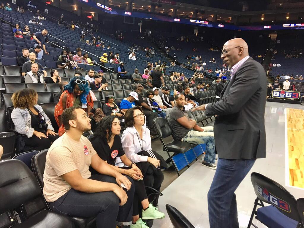BIG3 league commissioner Clyde Drexler talks to fans before Friday's game in Oakland. (Phil Barber / The Press Democrat)