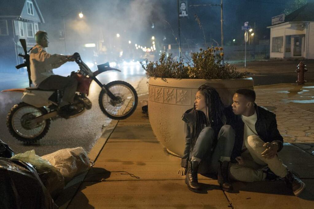 Lex Scott Davis and Joivan Wade, right, in a scene from “The First Purge,' about the origins of the government sanctioned evening of murder, revenge and violence designed to keep the murder rate for the rest of the year below 1 percent. (Annette Brown / Universal Pictures)