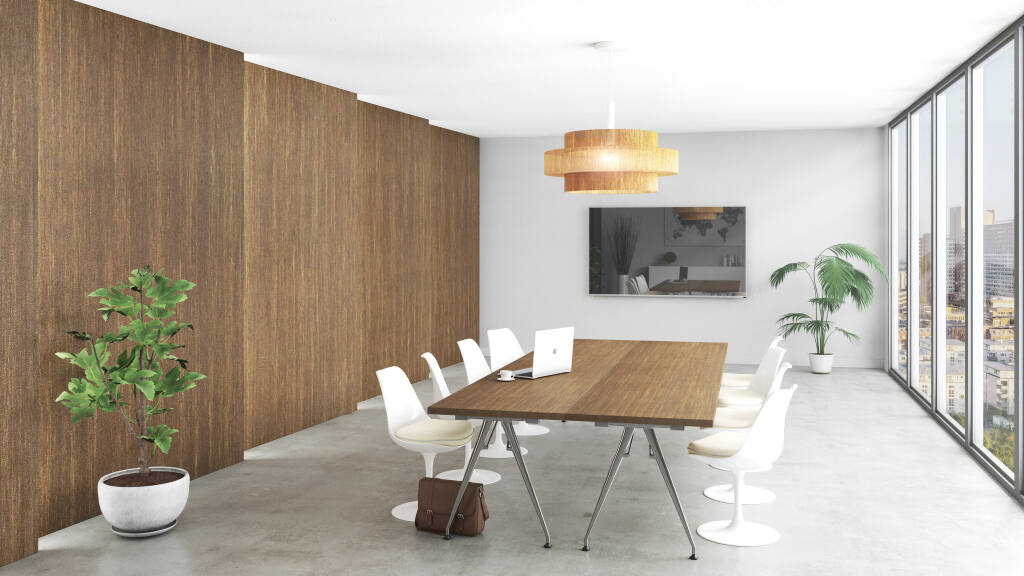 Lingrove’s Ekoa plant-based composite can be produced with various wood grains and take stains for commercial interiors such as this conference room. This view shows the material used as veneer on wall panels and the table. (Courtesy: Lingrove)