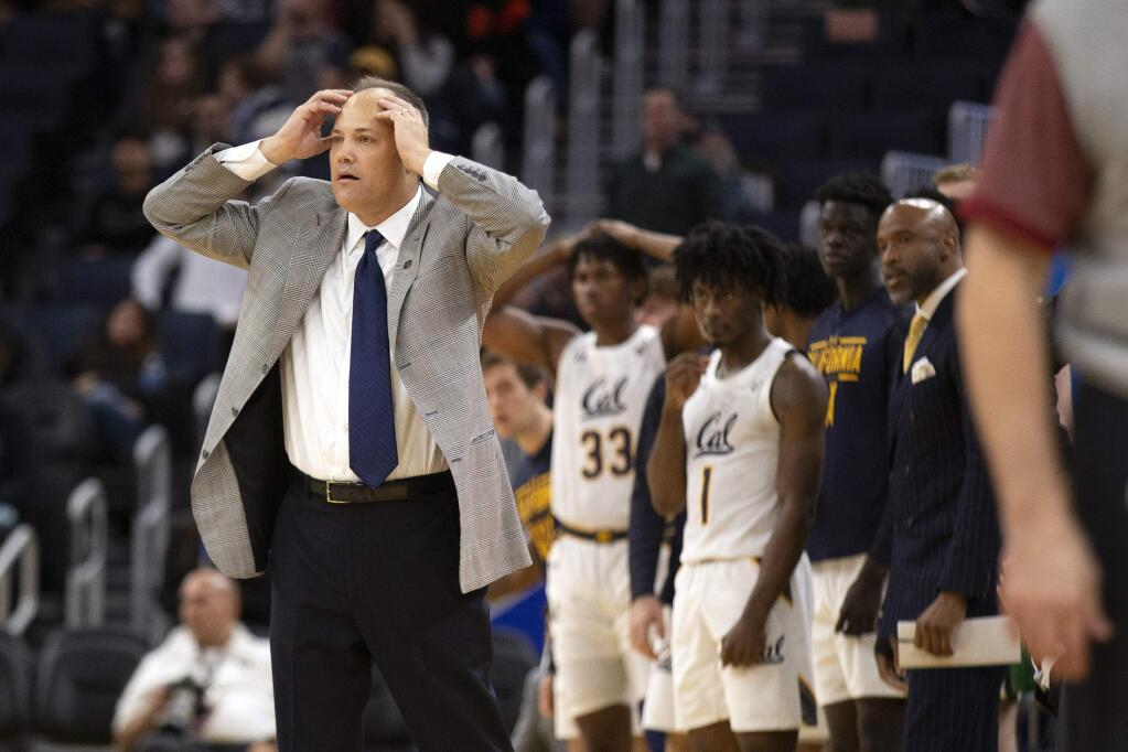 Cal head coach Mark Fox, left, reacts to his team's play against Boston College during the second half on Saturday, Dec. 21, 2019, in San Francisco. (AP Photo/D. Ross Cameron)