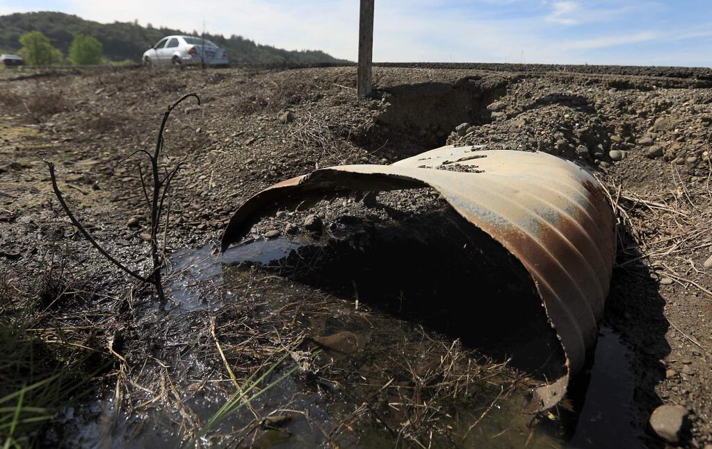 On Lytton Station Road near Geyserville, this culvert will be replaced from revenues derived from the new state gas tax, Tuesday, April 24, 2018. $9.8 million will be spent on roads around Sonoma County during the 2018-19 fiscal year. (Kent Porter / The Press Democrat) 2018