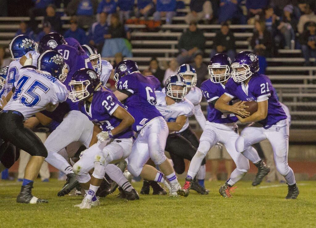 JOHN O'HARA FOR THE ARGUS-COURIERJacob Rollstin and Petaluma's Trojans hope to run to their sixth striaght win at home Friday night against Terra Linda.