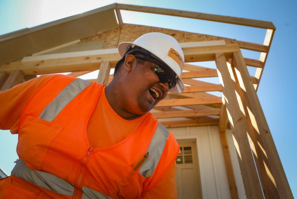 Santa Rosa, CA, USA._Monday, June 06, 2019._North Bay Construction Corps trained students like Cristhian Montiel,17, from throughout the county in a 'boot camp' to learn how to construct homes. They helped Habitat for Humanity construct temporary homes in Fountaingrove where wildfire victims lost their homes. The project, called Sonoma Wildfire Cottages consists of one and two-bedrooms.(CRISSY PASCUAL/ARGUS-COURIER STAFF)