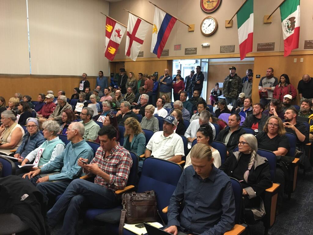 (FILE PHOTO) A standing-room only crowd gathered in the Sonoma County Board of Supervisors chambers in Santa Rosa for a meeting on marijuana cultivation on Thursday, Oct. 28, 2016. (J.D. MORRIS/ PD)