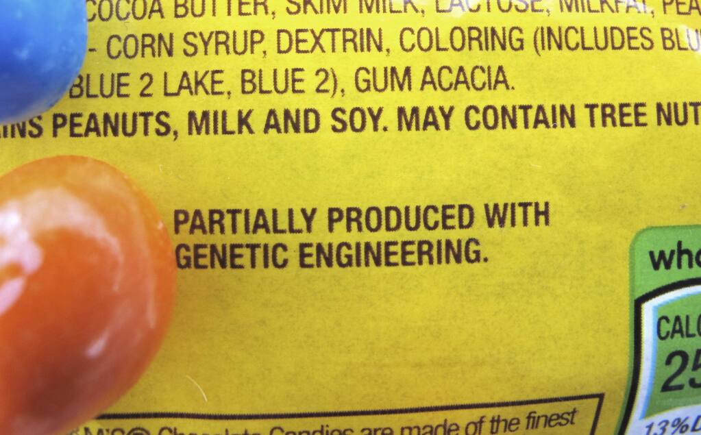A label saying food products are 'partially produced with genetic engineering' will be required in Vermont beginning in July. The labels already are appearing on many products around the country. (LISA RATHKE / Associated Press)