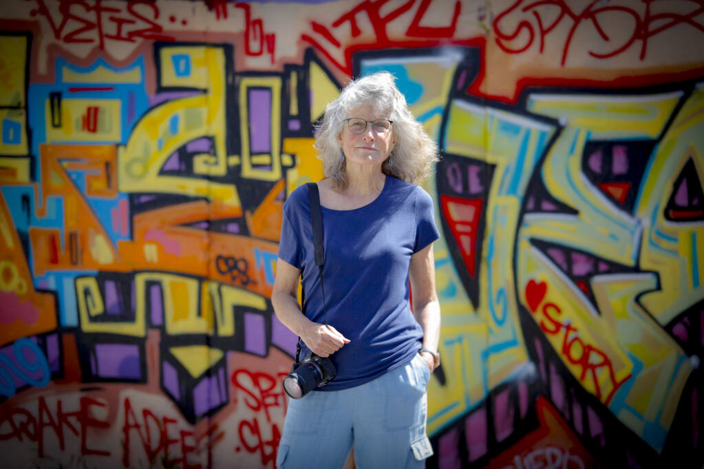 Petaluma photographer Gail Sickler has published a new photo book depicting downtown graffiti called “94952 Street Art.” (CRISSY PASCUAL/ARGUS-COURIER STAFF)