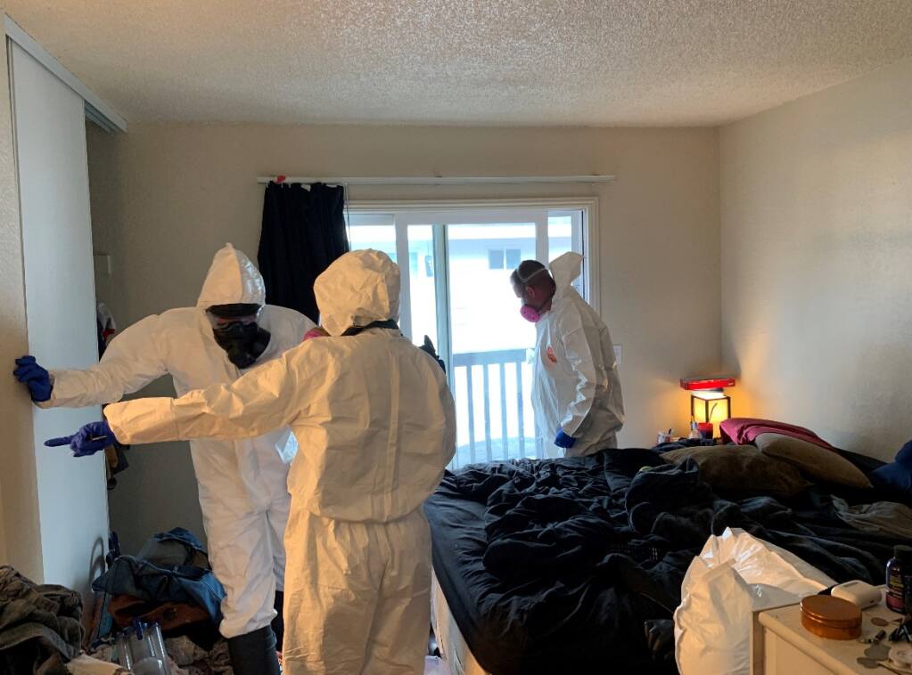 Santa Rosa investigators search a home where an unresponsive child was discovered Monday, May 9, 2022. The toddler died and investigators found fentanyl at the scene, police said. (Santa Rosa Police Department)