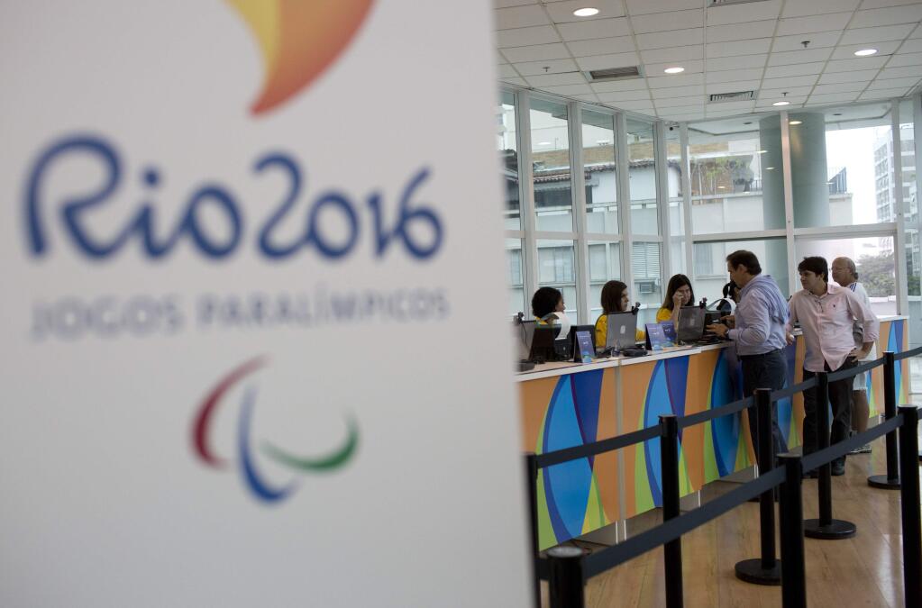 People buying Olympic tickets at a shopping mall in Rio de Janeiro. (SILVIA IZQUIERDO / Associated Press)
