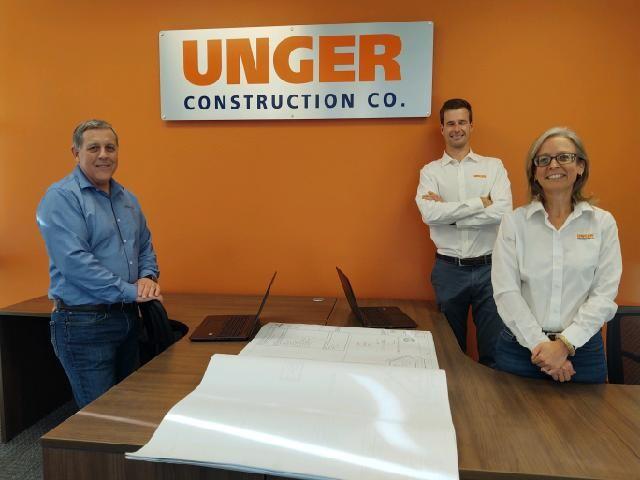 Mike Mencarini, left, president of Unger Construction, poses with management of the North Bay office, which is set to open in Petaluma in mid-December. With him are, far right, project executive Kathy Sherry and manager Chris Maxwell. (courtesy photo)