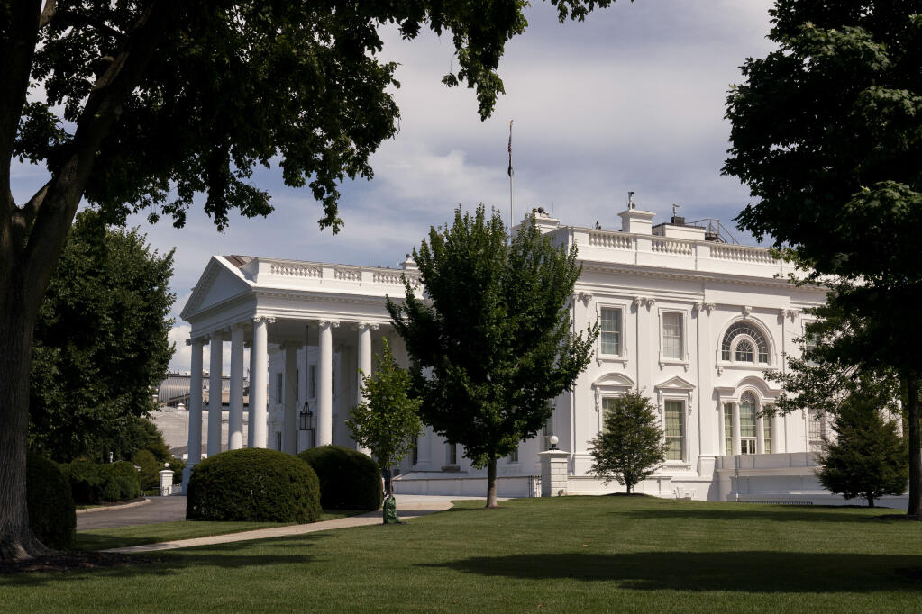 The White House is seen Saturday, July 30, 2022, in Washington. President Joe Biden tested positive for COVID-19 again Saturday, slightly more than three days after he was cleared to exit coronavirus isolation, the White House said, in a rare case of "rebound" following treatment with an anti-viral drug. (AP Photo/Manuel Balce Ceneta)