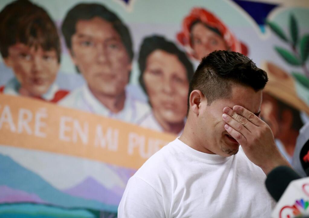 FILE - In this June 25, 2018 file photo, Christian, from Honduras, recounts his separation from his child at the border during a news conference at the Annunciation House,in El Paso, Texas. (AP Photo/Matt York, File)