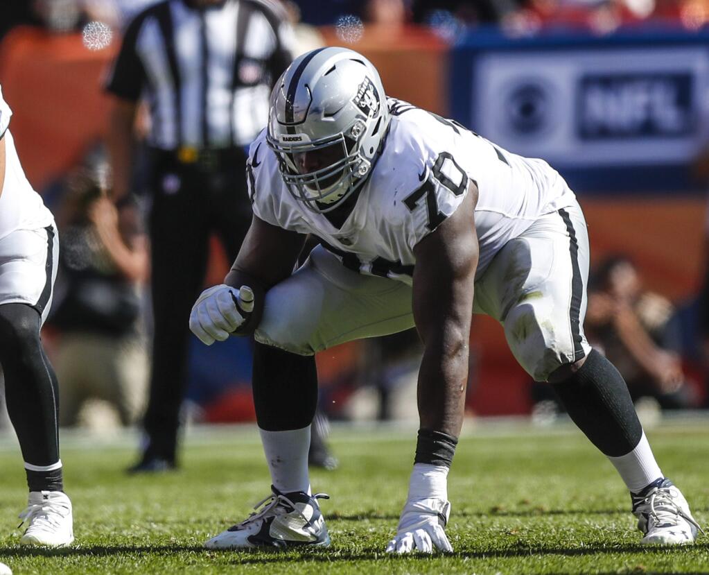 Oakland Raiders offensive tackle Kelechi Osemele lines up against the Denver Broncos during the first half, Sunday, Sept. 16, 2018, in Denver. (AP Photo/Jack Dempsey)
