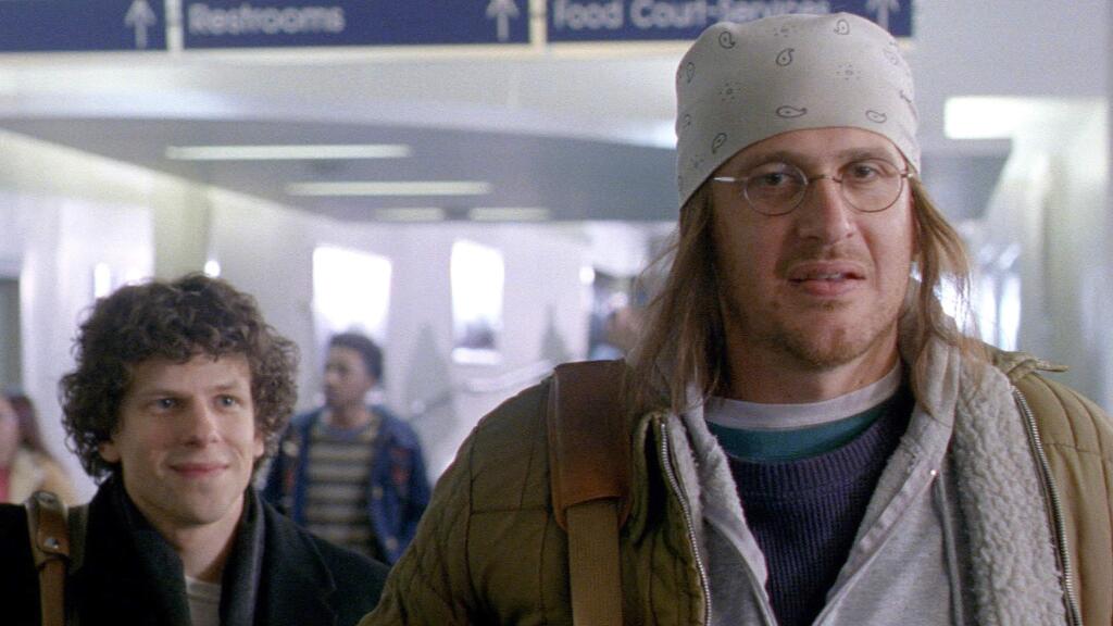 Jason Segel as author David Foster Wallace and Jesse Eisenberg as David Lipsky, the writer sent to interview Wallace in 'The End of the Road,' a film based on Lipsky's recollections of the experience. (A24 Films)