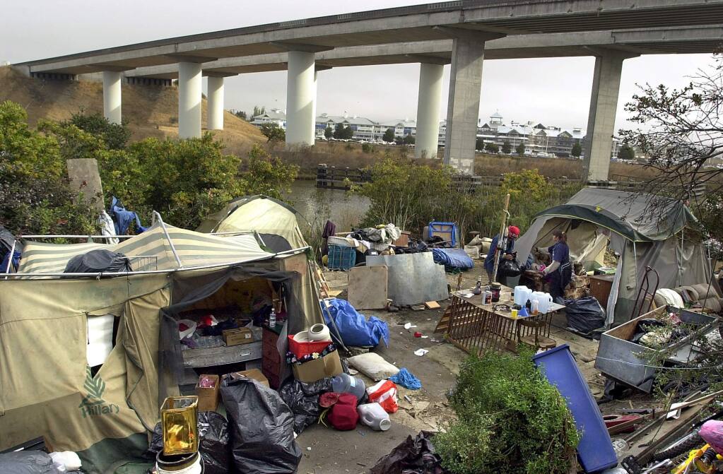 A homeless camp along the Petaluma River in 2001. (PD FILE)