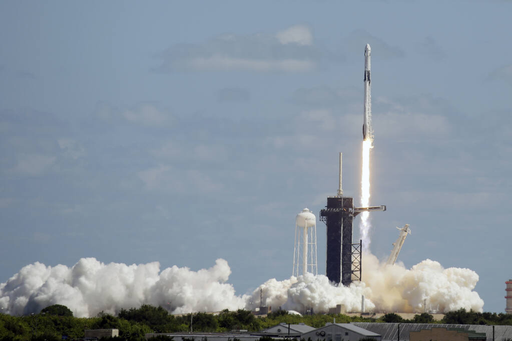 A SpaceX Falcon 9 rocket with the Crew-5 astronauts lifts off on Pad 39A at the Kennedy Space Center in Cape Canaveral, Fla., Wednesday, Oct. 5, 2022, for a mission to the International Space Station. (AP Photo/John Raoux)
