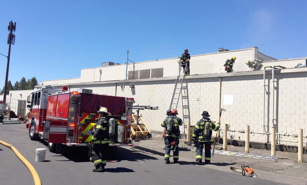 Fire crews at the scene of a fire at Safeway in Rohnert Park on Monday, July 15, 2019. (KENT PORTER/ PD)