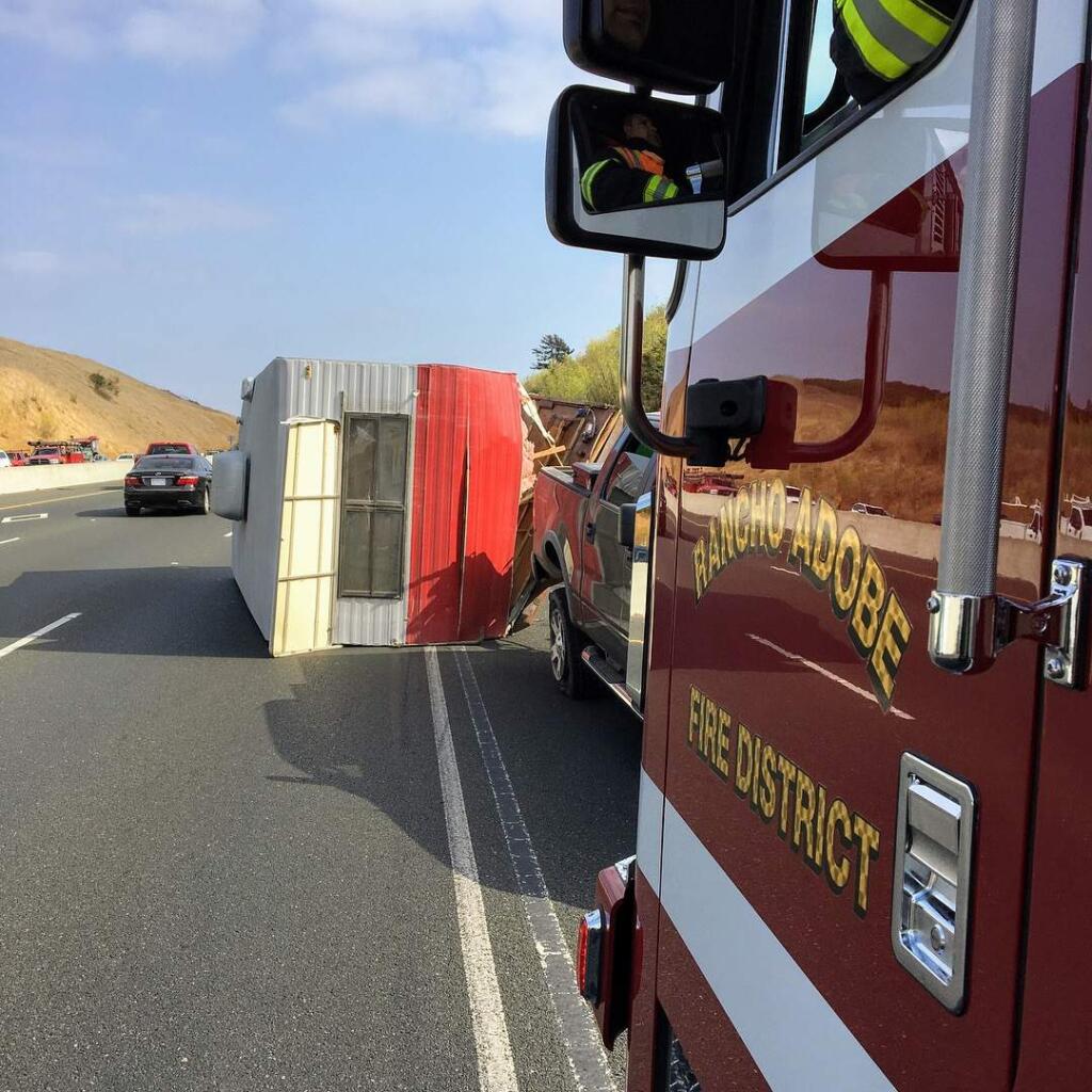 An overturned trailer on southbound Highway 101 between Cotati and Petaluma snarled traffic on Monday, Aug. 21, 2017. (COURTESY OF RANCHO ADOBE FIRE CAPTAIN JIMMY BERNAL)
