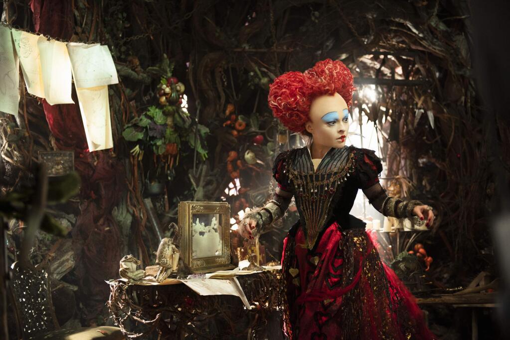 In this image released by Disney, Helena Bonham Carter, portraying the Red Queen, appears in a scene from 'Alice Through The Looking Glass .' (Disney via AP)