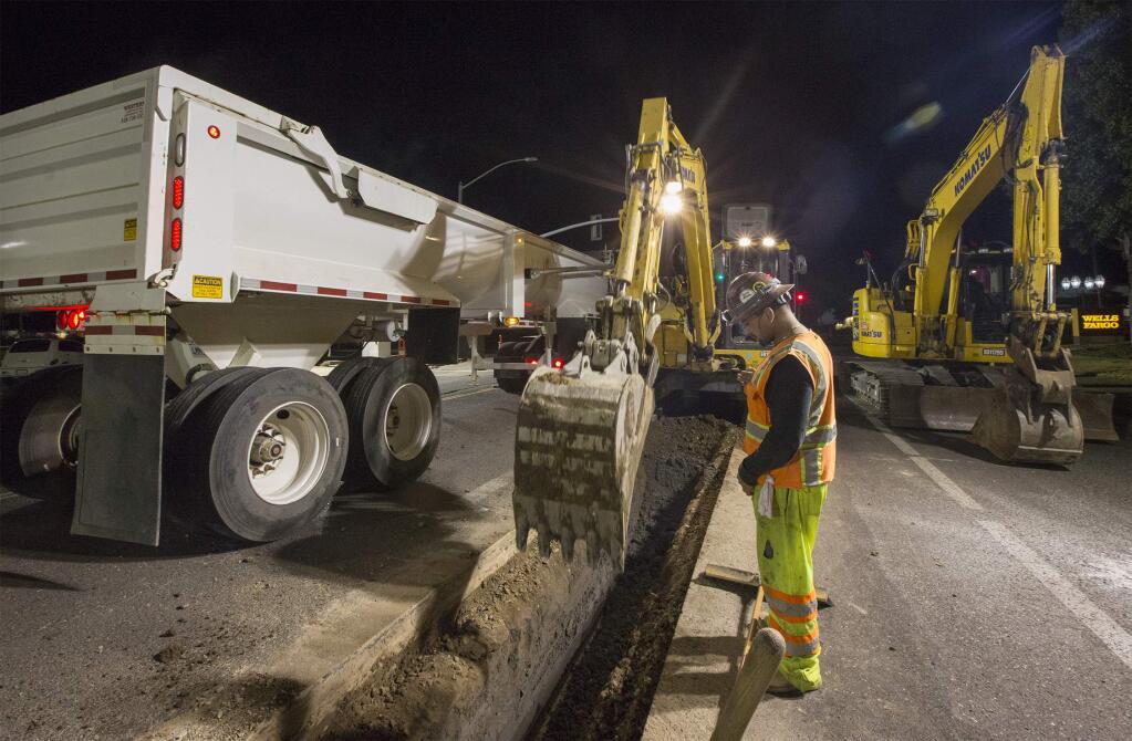 Night work along the entire length of West Napa Street will continue until October. While you were sleeping, workers were busy digging a trench and laying a new water line. (Photo by Robbi Pengelly/Index-Tribune)