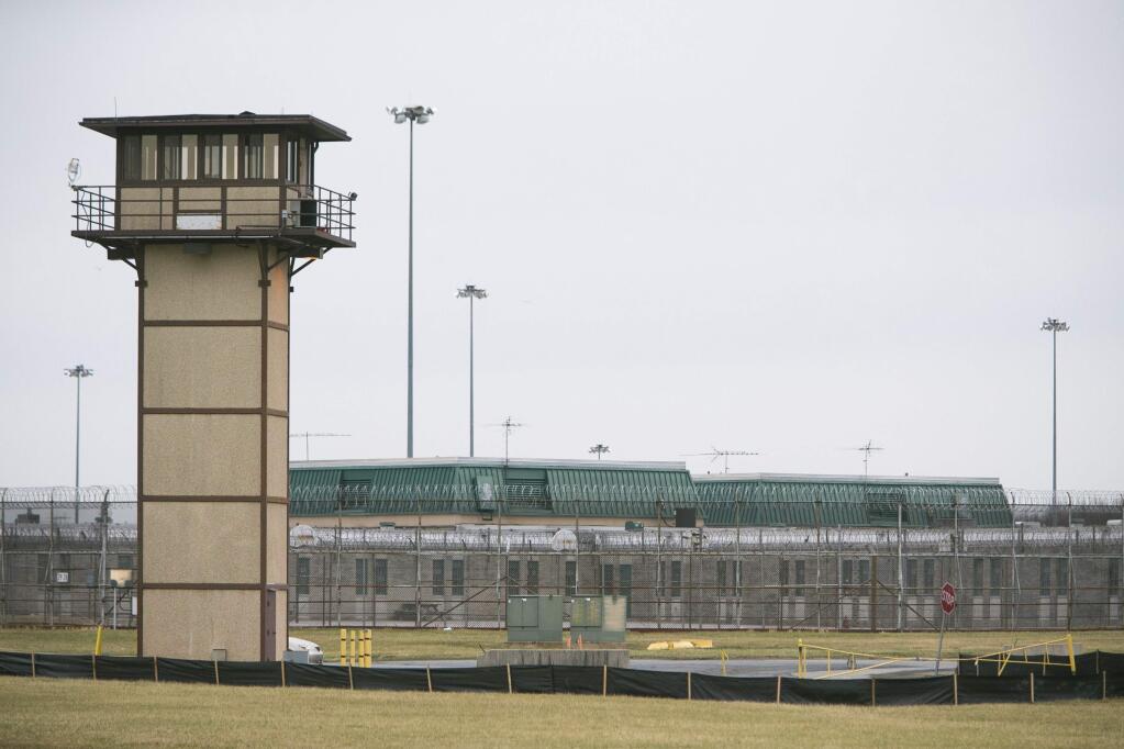 Vaughn Correctional Center near Smyrna, Del., remains on lockdown following a disturbance on Wednesday, Feb. 1, 2017. Geoffrey Klopp, president of the Correctional Officers Association of Delaware, said he had been told by the Department of Correction commissioner that prison guards had been taken hostage at the James T. Vaughn Correctional Center in Smyrna. (Suchat Pederson/The Wilmington News-Journal via AP)