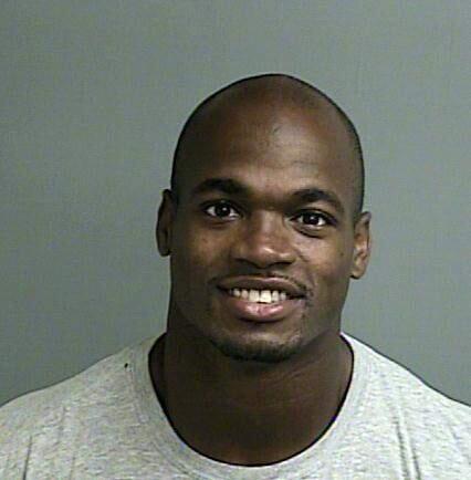 This photo provided by the Montgomery County sheriffís office shows the booking photo of Adrian Peterson. Peterson was indicted in Texas for using a branch to spank one of his sons and the Minnesota Vikings promptly benched him for their game Sunday, Sept. 14, 2014 against the New England Patriots. Peterson turned himself in early Saturday at a jail in Montgomery County, near Houston, where he has a home. He was processed and released. (AP Photo/Montgomery County sheriffís office)