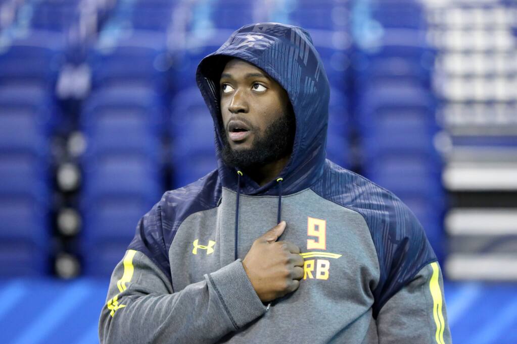 LSU running back Leonard Fournette is seen before a drill at the NFL scouting combine Friday, March 3, 2017, in Indianapolis. (AP Photo/Gregory Payan)