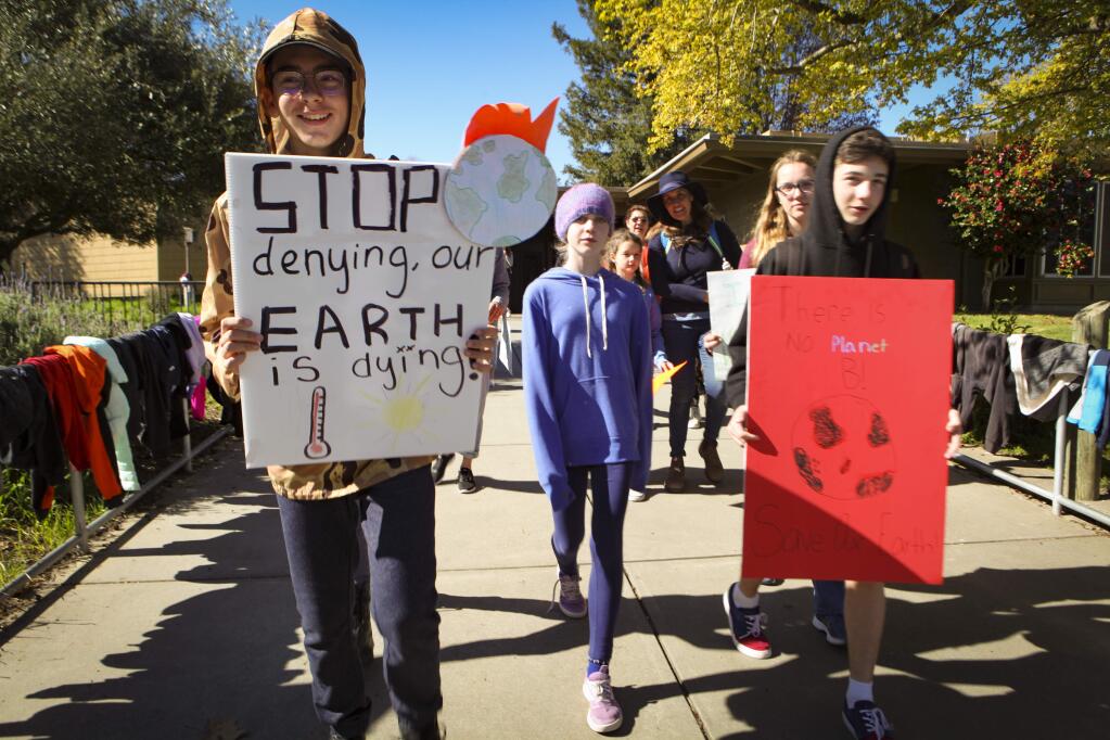 Petaluma, CA, USA._Friday, March 15, 2019. Students from Mary Collins at Cherry Valley School walked out of school and marched to downtown to bring attention to their climate change cause.(CRISSY PASCUAL/ARGUS-COURIER STAFF)
