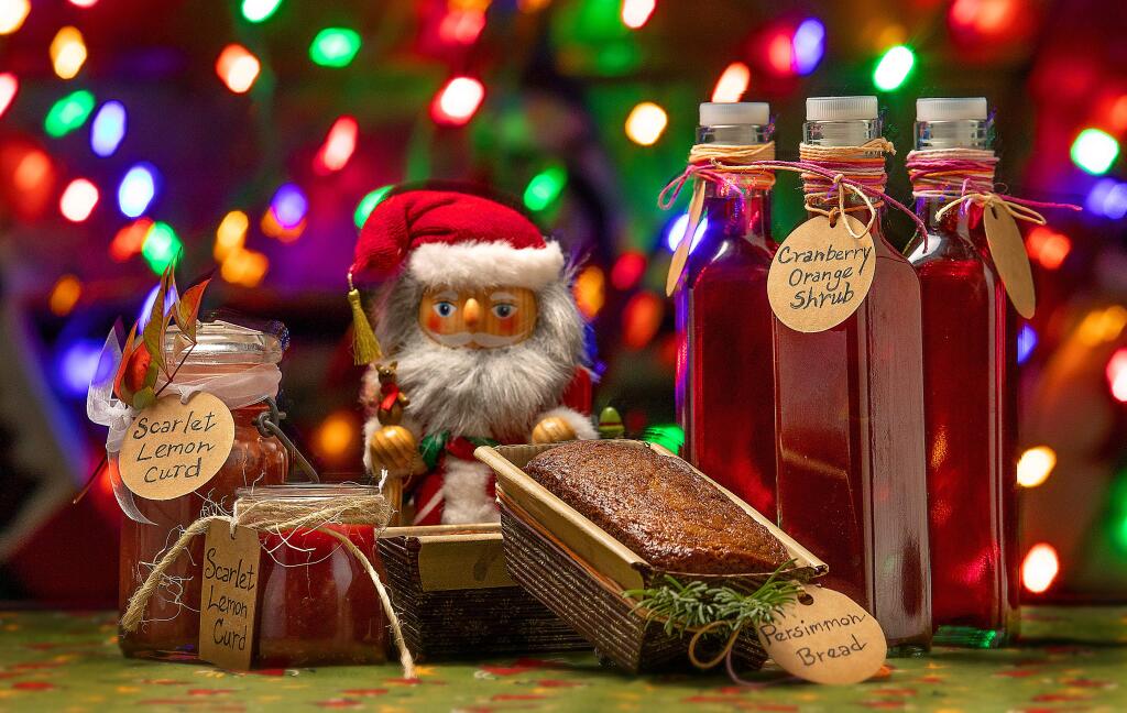 John Burgess / The Press DemocratLast-minute homemade Christmas gift ideas for the foodie in your life, from left, Scarlet Lemon Curd, Little Persimmon Bread and Cranberry Orange Shrub.