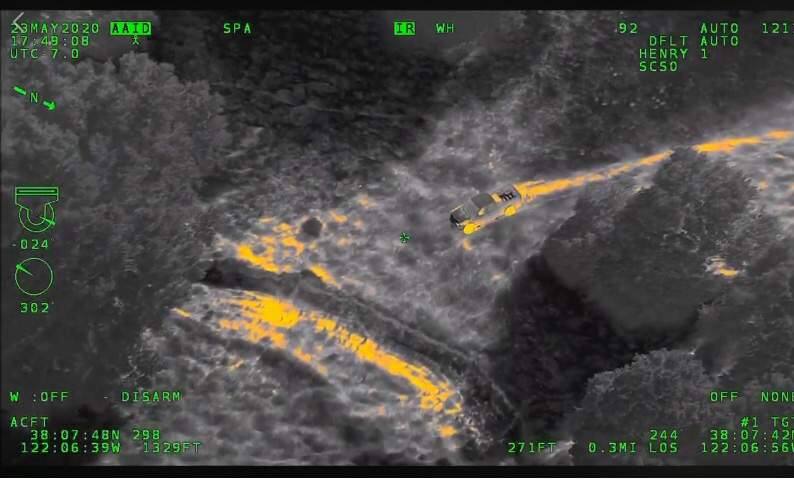 Image from videotape of a Henry-1 helicopter chase of a felony theft suspect. Image is in night-vision mode. (SCSO)