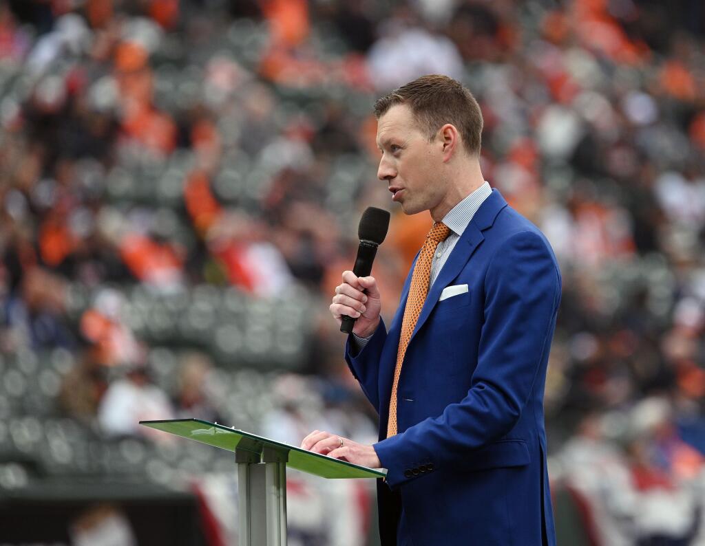 Orioles broadcaster Kevin Brown emcees pregame activities during the team's home opener earlier this season. (Kenneth K. Lam / Baltimore Sun)