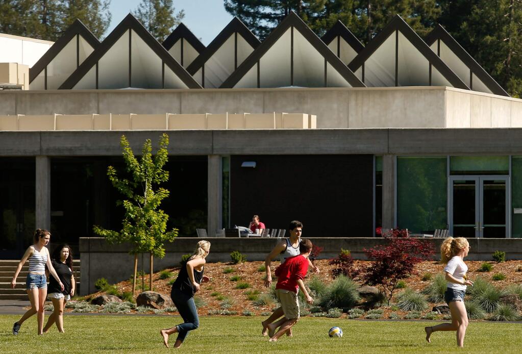 Sonoma State University students play a pickup game of soccer in front of the Wine Spectator Learning Center, which is part of the Wine Business Institute at Sonoma State University in Rohnert Park, California, on Thursday, May 10, 2018. (Alvin Jornada / The Press Democrat)