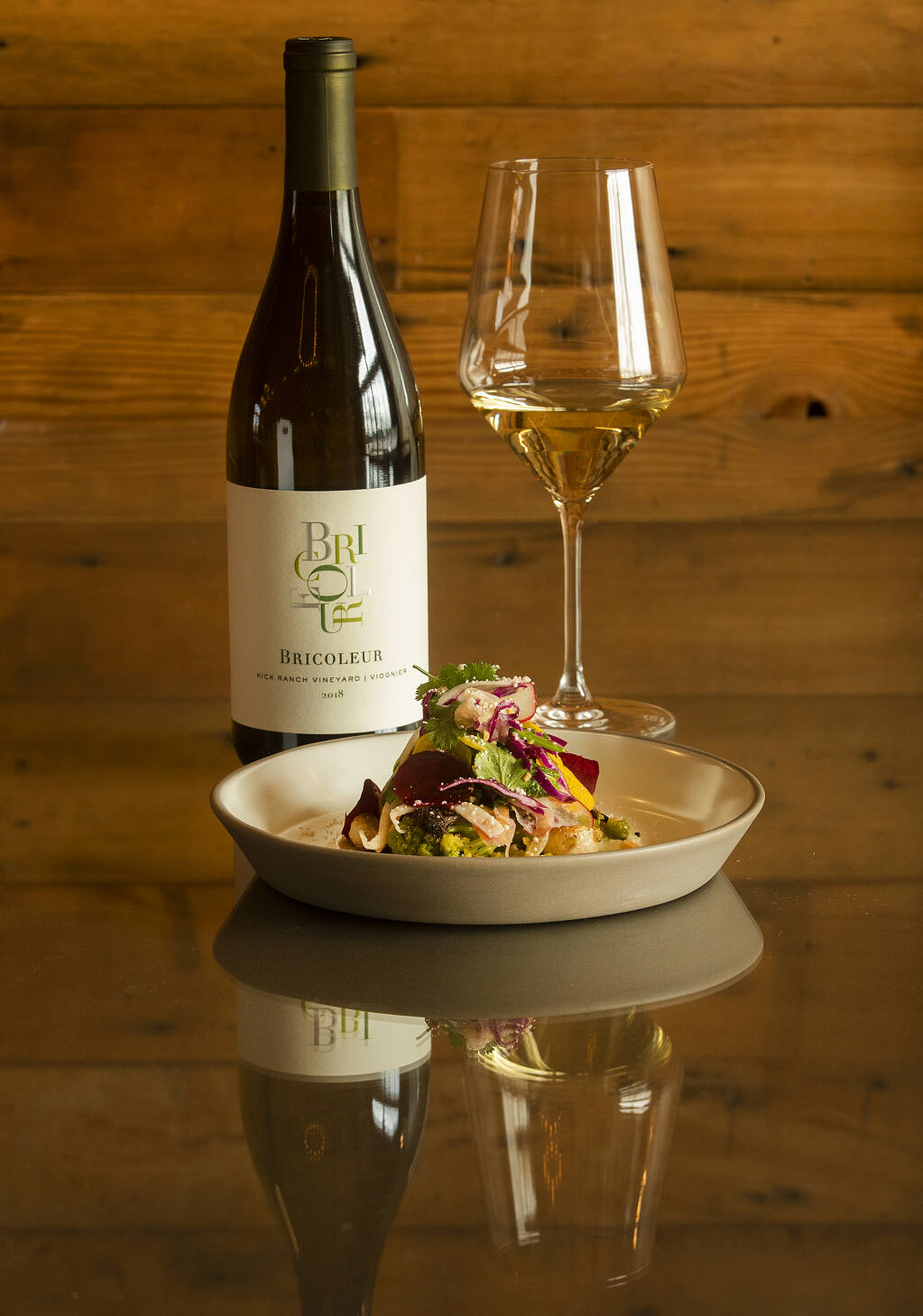 Citrus Spiced Vegetables are paired with the Bricoleur 2018 Kick Ranch Vineyard Viognier from Chef Shane McAnelly's tasting menu at the new Bricoleur Vineyards in Windsor on Thursday, Feb. 18, 2021. (John Burgess / The Press Democrat)