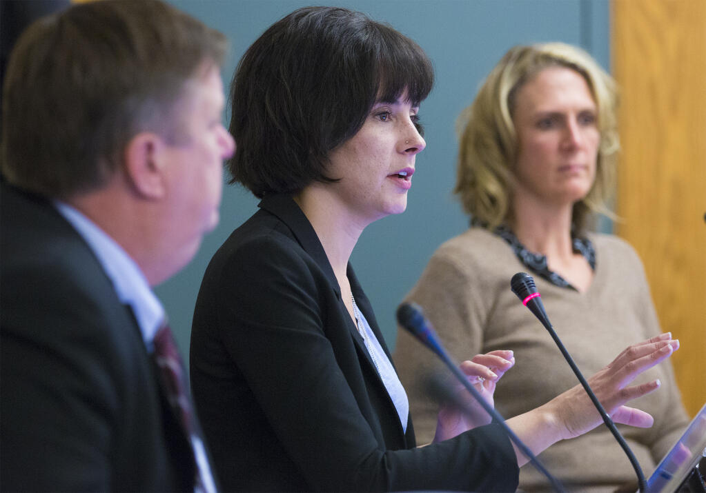 Councilmember Rachel Hundley, center, at a meeting in 2019 with Councilmembers David Cook and Amy Harrington. (Photo by Robbi Pengelly/Index-Tribune)