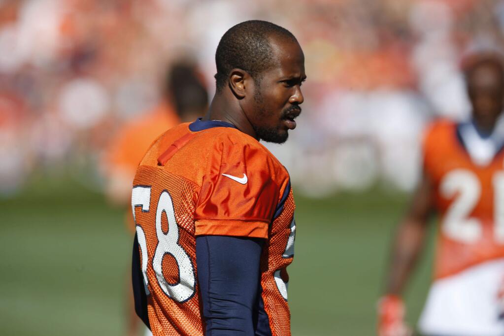 Denver Broncos outside linebacker Von Miller (58) during the morning session at the team's NFL training camp Wednesday, Aug. 12, 2015, in Englewood, Colo. (AP Photo/David Zalubowski)