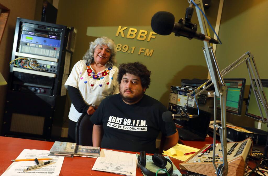 Spanish language radio station program director Edgar Avila, right, and general manager Alicia Sanchez kept the Latino community informed after the October wildfires. (photo by John Burgess/The Press Democrat)