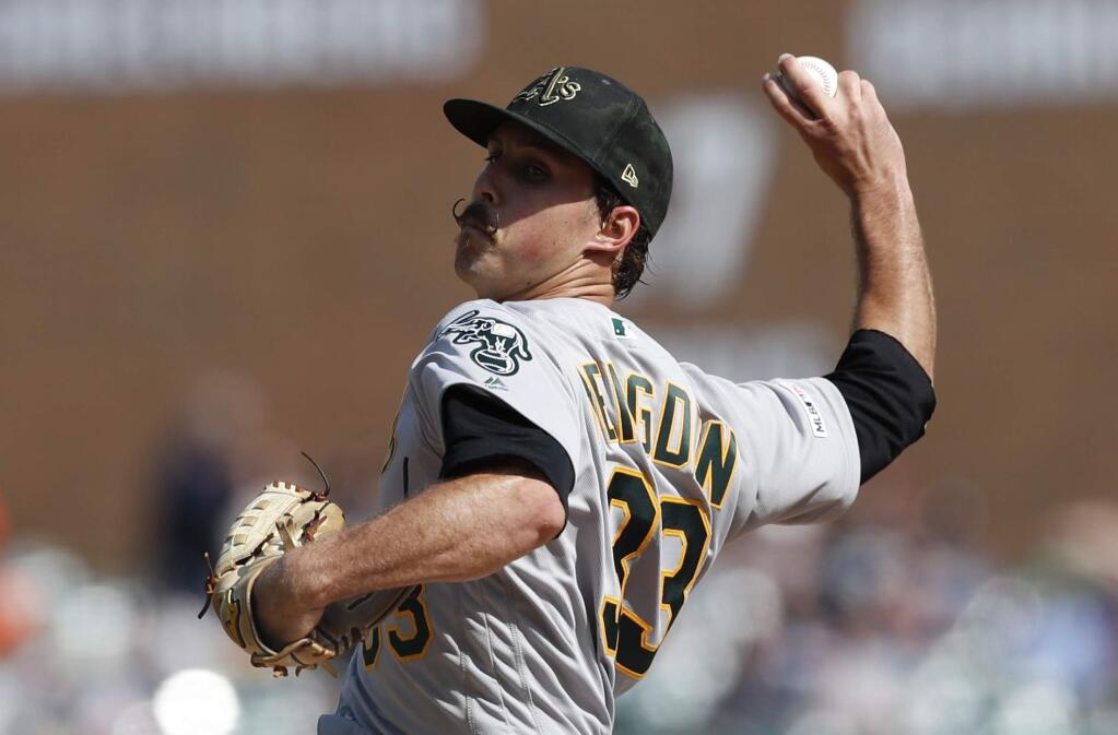 Oakland Athletics starting pitcher Daniel Mengden throws during the second inning against the Detroit Tigers, Saturday, May 18, 2019, in Detroit. (AP Photo/Carlos Osorio)