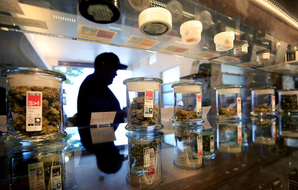 A customer leaves with his purchase at the Peace in Medicine dispensary in Santa Rosa in 2017. The dispensary is now run by Sparc, which hopes to open a dispensary in Sonoma in 2021. (KENT PORTER/ PD)