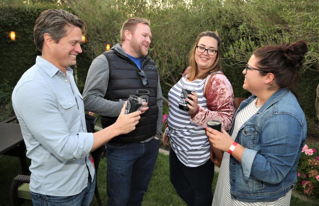 (from Left) Stu Wagner, Keith Neyman, Kelsey Butler and Amy Alvarez enjoy cold beer in the Beer Garden at the Green Music Center, SSU. Award winning American hip-hop recording artist, film producer and poet, Common performed at the Green Music Center at Sonoma State University in Rohnert Park, Saturday, Sept. 16, 2017. (Will Bucquoy / For the Press Democrat)