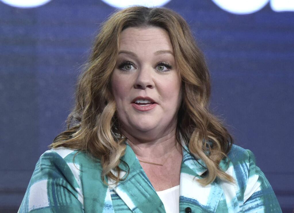 FILE - In this Friday, Jan. 13, 2017, file photo, executive producer Melissa McCarthy speaks at the 'Nobodies' panel at Viacom's TV Land portion of the Winter Television Critics Association press tour, in Pasadena, Calif. McCarthy lampooned White House press secretary Sean Spicer in a ‚ÄúSaturday Night Live‚Äù sketch on Saturday, Feb. 4, 2017, where she taunted reporters as ‚Äúlosers,‚Äù fired a water gun at the press corps and even used the podium to bash a Wall Street Journal journalist. (Photo by Richard Shotwell/Invision/AP, File)