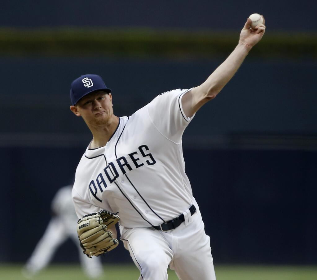 San Diego Padres starting pitcher Eric Lauer delivers during the first inning of a baseball game against the Oakland Athletics in San Diego, Tuesday, June 19, 2018. (AP Photo/Alex Gallardo)