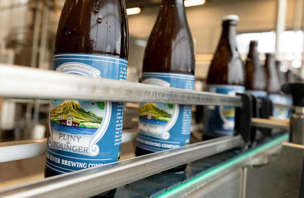 The 20th anniversary 2024 Pliny the Younger triple IPA heading down the bottling line at the Russian River Brewing Co. in Windsor, Tuesday, March 19, 2024. (John Burgess / The Press Democrat)