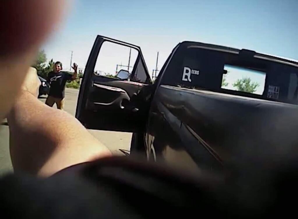 Fresno police body-camera video showns an officer pointing a gun at Dylan Noble, who was shot after ignoring repeated commands to stand still and show his hands. (Fresno Police Department)
