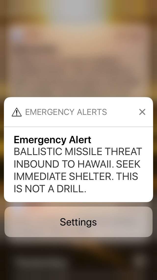 This smartphone screen capture shows a false incoming ballistic missile emergency alert sent from the Hawaii Emergency Management Agency system on Saturday, Jan. 13, 2018. (AP Photo/Caleb Jones)