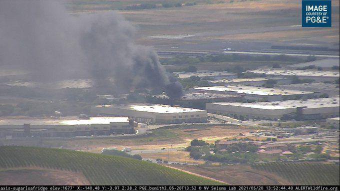 This PG&E wildfire camera on the eastern peaks of Napa Valley captured a fire at a wine warehouse at 645 Devlin Road in south Napa on Thursday afternoon, May 20. (PG&E image via Napa Valley Register)