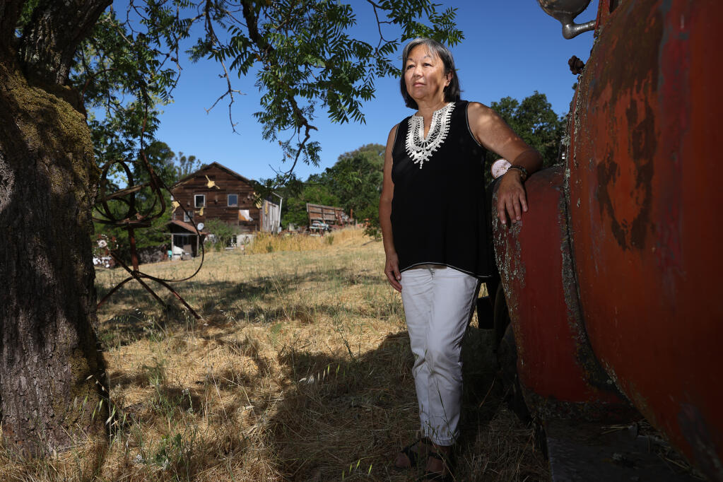 Laurie Fong, a Santa Rosa School Board member, and her daughter, Kelly Rivas, were featured in a "Talks with Mom" video series to promote wildfire preparedness.  Fong, who had to evacuate during the Glass fire, has taken fire mitigation measures on her own property.  (Christopher Chung/ The Press Democrat)