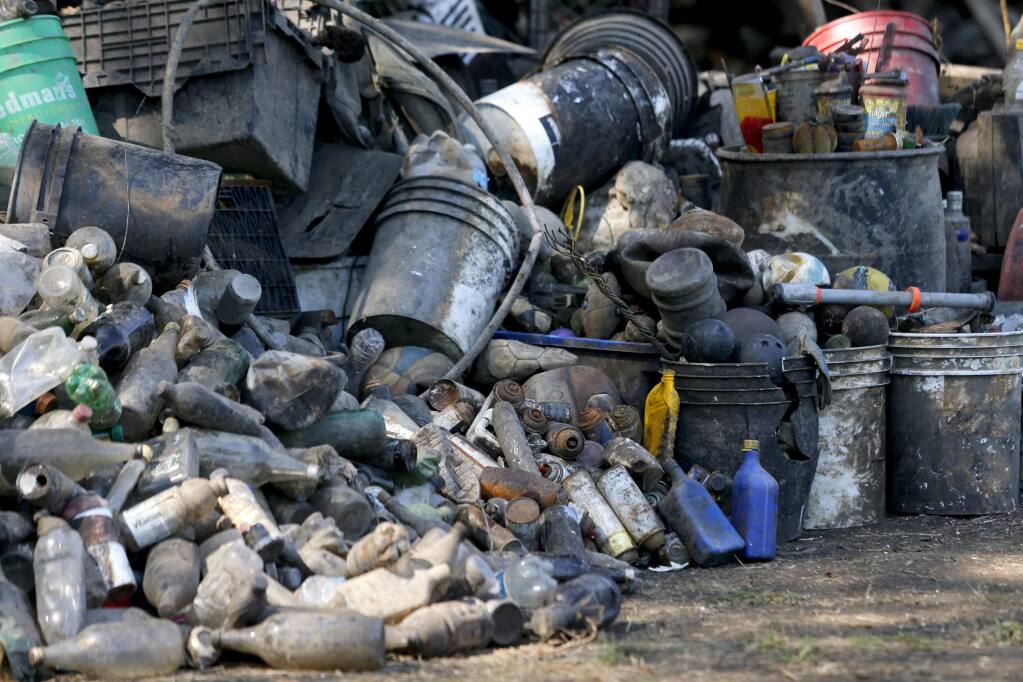 Piles of garbage from the Laguna de Santa Rosa sit on display during the 'Great Laguna Garbage Patch' event in Santa Rosa, on Thursday, September 17, 2015. (BETH SCHLANKER/ The Press Democrat)